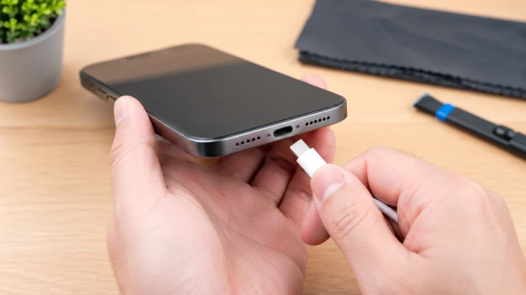 Checking an iPhone charging port before repair